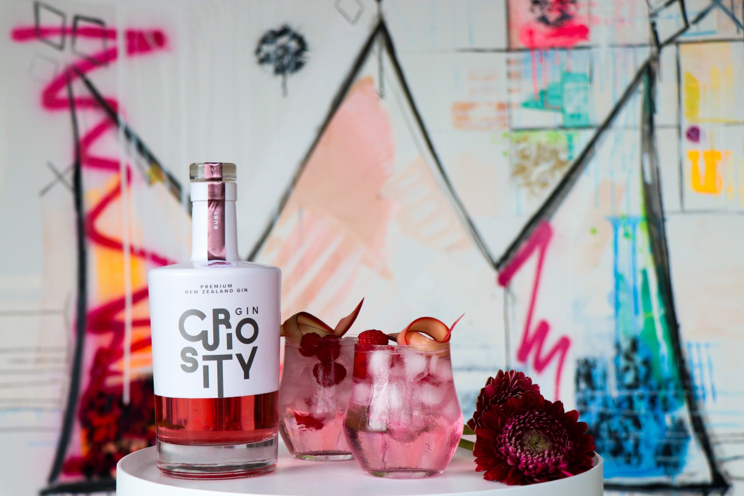 Curiosity Gin Ruby with cocktails